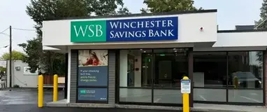 a building with a sign in front of it