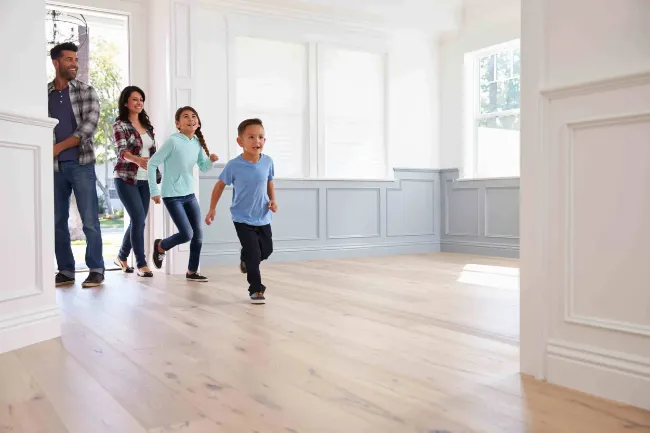 A family viewing their potential new home
