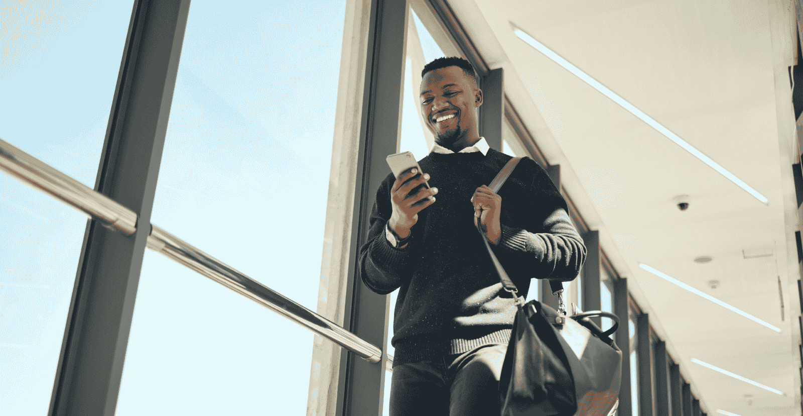 Business traveler on the phone, representing mobility, connectivity, and financial freedom.